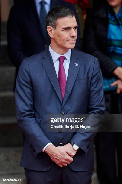 President of the Spanish Government Pedro Sanchez watchs a military parade after the solemn opening of the 15th legislature at the Spanish Parliament...