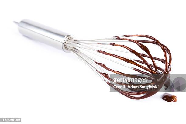 wire whisk with chocolate - ballonklopper stockfoto's en -beelden