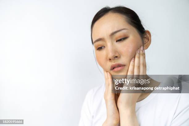 toothache,jaw pain - menschlicher kieferknochen stock-fotos und bilder