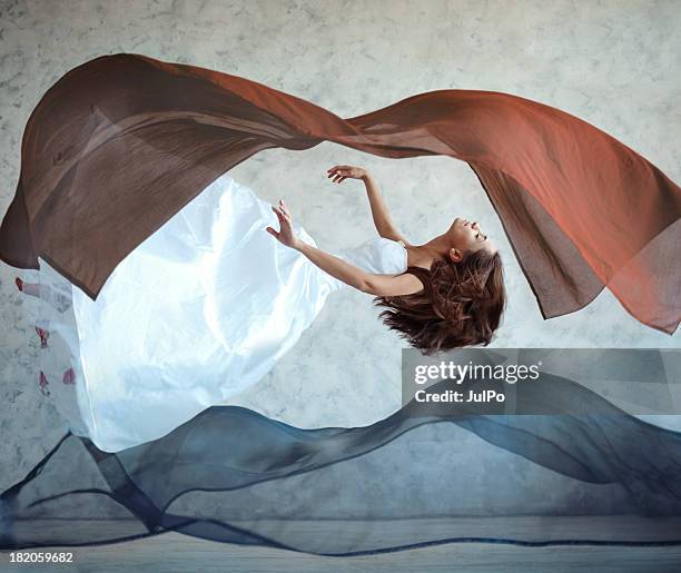 flying woman - person falling mid air stock pictures, royalty-free photos & images