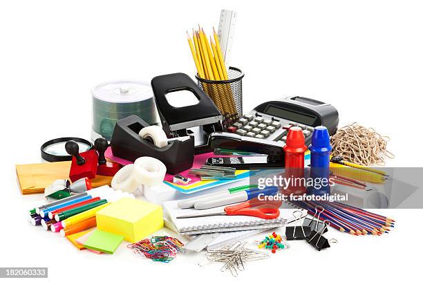 large assortment of office supplies on white backdrop - office supply stock pictures, royalty-free photos & images
