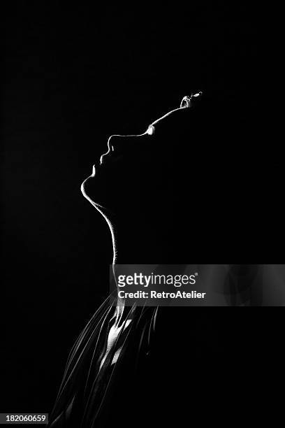 old hollywood.her silhouette - woman portrait film noir stock-fotos und bilder