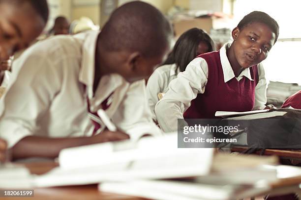 south african teenagers flirting in class - south african culture stock pictures, royalty-free photos & images