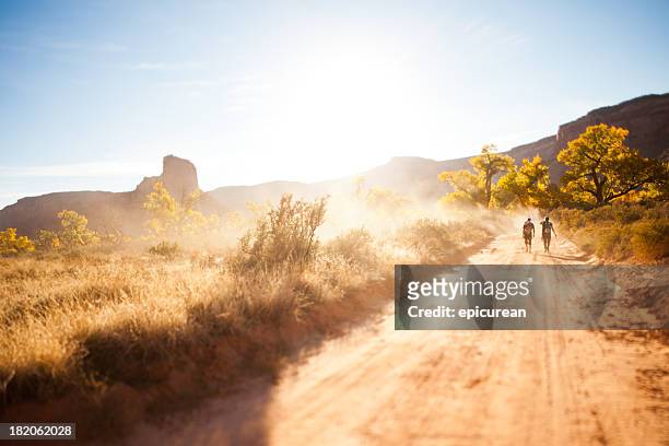 husband and wife going for a hike together in utah - hiking utah stock pictures, royalty-free photos & images