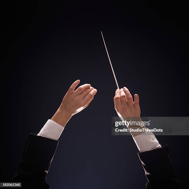 conducting buttons - musical conductor stock pictures, royalty-free photos & images