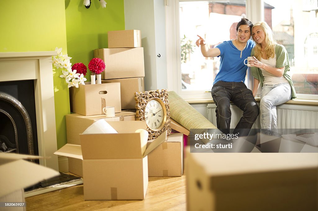 Young Couple Moving into a New Home