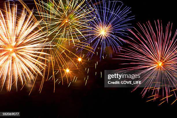 fireworks - firework display stock pictures, royalty-free photos & images