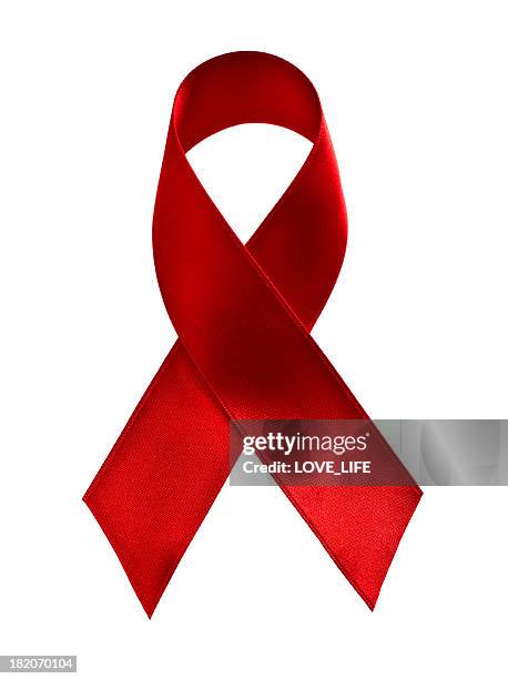 cinta roja contra el sida - sida fotografías e imágenes de stock