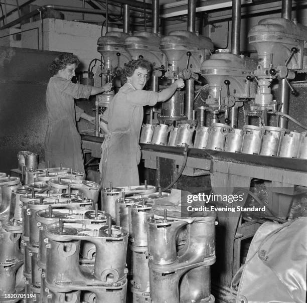 Workers making the Kenwood Chef A700 D food mixer at the Kenwood Manufacturing Company factory in Woking, Surrey, October 21st 1957.