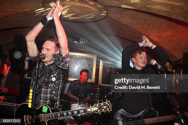 Dan Gillespie Sells and Richard Jones from The Feeling perform at the 50th Birthday Celebration of Annabel's Nightclub on September 27, 2013 in...