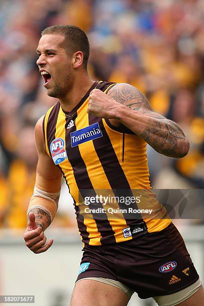 Lance Franklin of the Hawks celebrates kicking a goal during the 2013 AFL Grand Final match between the Hawthorn Hawks and the Fremantle Dockers at...