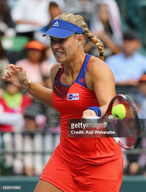 Angelique Kerber of Germany in action during her women's singles final match against Petra Kvitova of Czech Republic during day seven of the Toray...