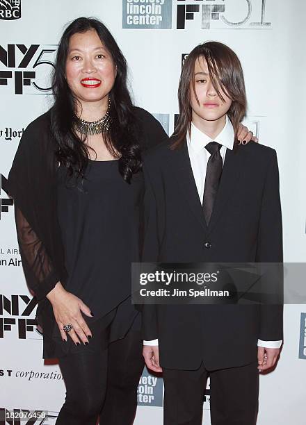 Executive Director at Film Society of Lincoln Center Rose Kuo and son Justin attend the opening night gala world premiere of "Captain Phillips"...