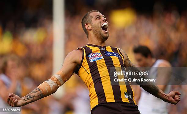 Lance Franklin of the Hawks celebrates winning the 2013 AFL Grand Final match between the Hawthorn Hawks and the Fremantle Dockers at Melbourne...