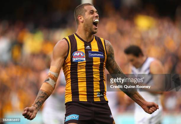 Lance Franklin of the Hawks celebrates winning the 2013 AFL Grand Final match between the Hawthorn Hawks and the Fremantle Dockers at Melbourne...