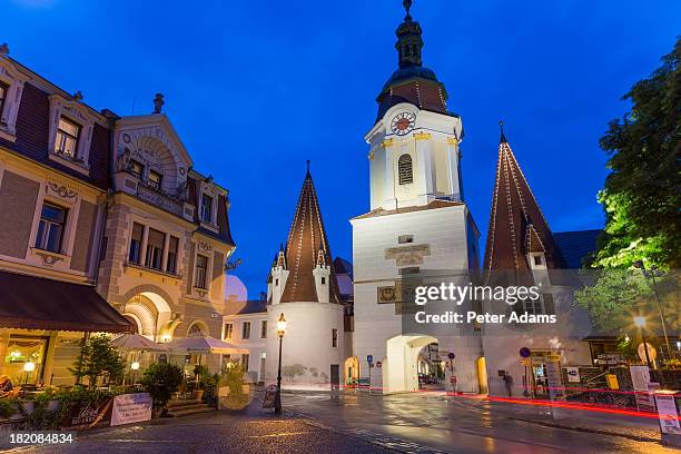 city gate at dusk, krems, wachau, austria - krems austria stock pictures, royalty-free photos & images