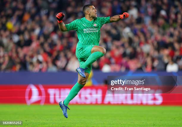 Walter Benitez of PSV Eindhoven celebrates the team's second goal after an own goal from Nemanja Gudelj of Sevilla FC during the UEFA Champions...