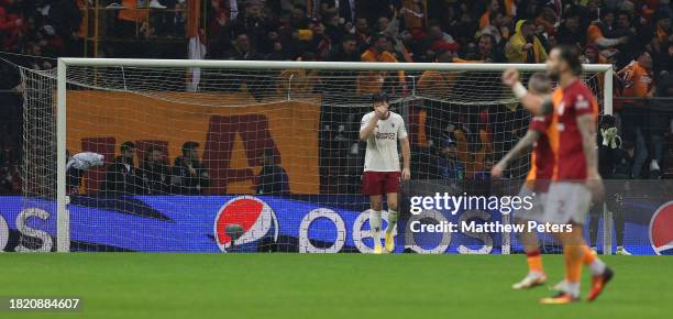 Harry Maguire, Andre Onana of Manchester United react to conceding a goal during the UEFA Champions League match between Galatasaray A.S. And...