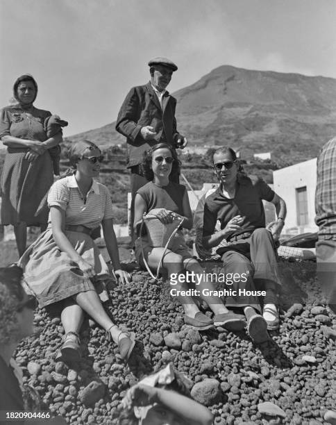 Swedish actress Ingrid Bergman with her secretary, Ellen Neuwald, and her publicist, Joseph H. Steele, during filming of 'Stromboli', , directed by...