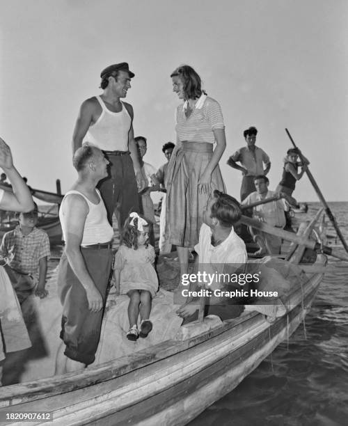 Actors Mario Vitale and Ingrid Bergman during filming of 'Stromboli', , directed by Roberto Rossellini, Italy, 1950.