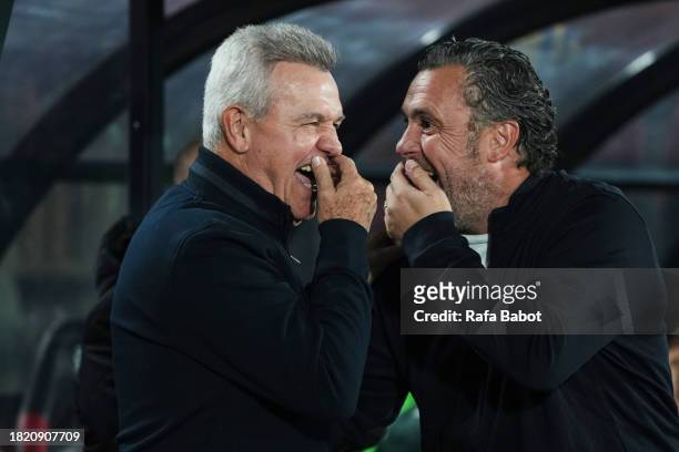 Javier Aguirre, head coach of RCD Mallorca speaks with Sergio Gonzalez, head coach of Cadiz CF prior to the LaLiga EA Sports match between RCD...