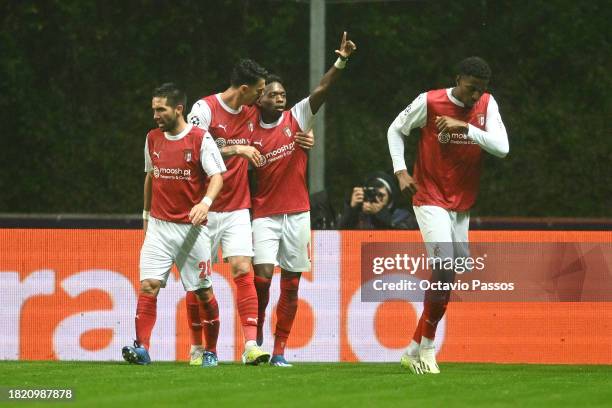 Alvaro Djalo of SC Braga celebrates with teammates after scoring the team's first goal during the UEFA Champions League match between SC Braga and 1....