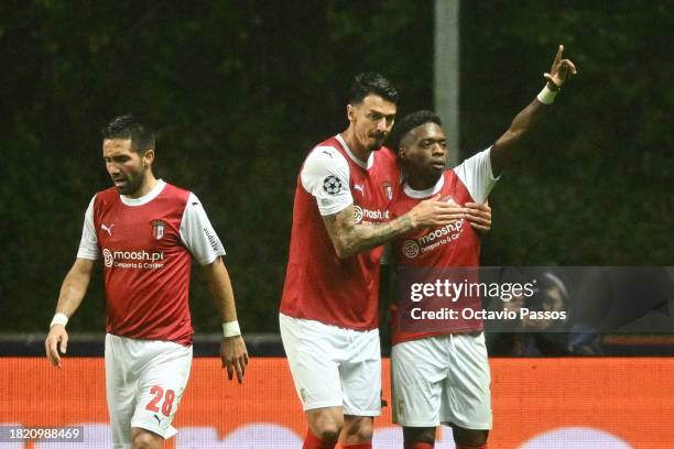 Alvaro Djalo of SC Braga celebrates with teammates after scoring the team's first goal during the UEFA Champions League match between SC Braga and 1....