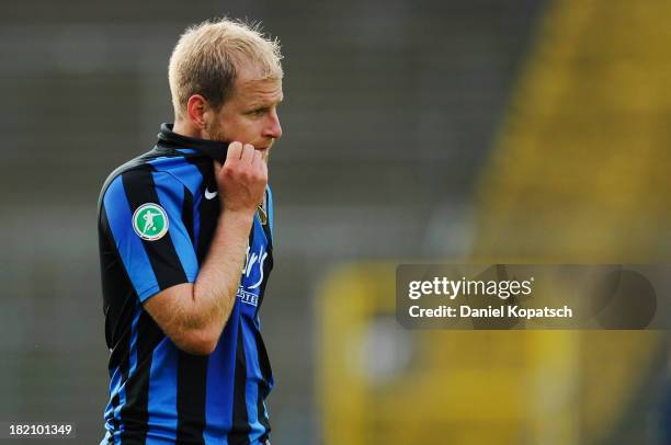 Philipp Kreuels of Saarbruecken reacts after the third Bundesliga match between 1. FC Saarbruecken and Darmstadt 98 on September 28, 2013 in...