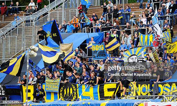 Supporters of Saarbruecken react during the third Bundesliga match between 1. FC Saarbruecken and Darmstadt 98 on September 28, 2013 in Saarbruecken,...