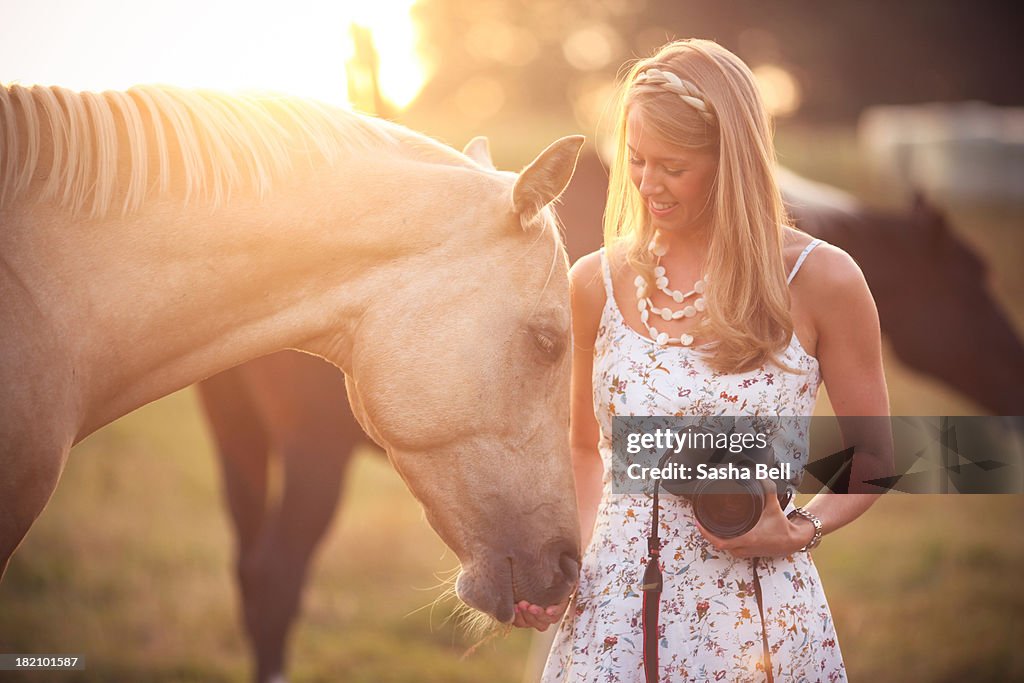 Woman with palomino horse