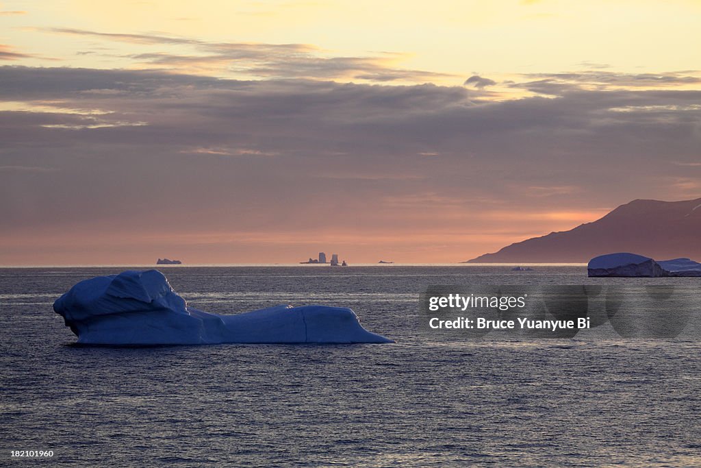 Night view of icebergs floating in Davis Strait