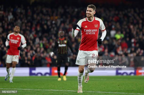 Jorginho of Arsenal celebrates after scoring the team's sixth goal from the penalty spot during the UEFA Champions League match between Arsenal FC...