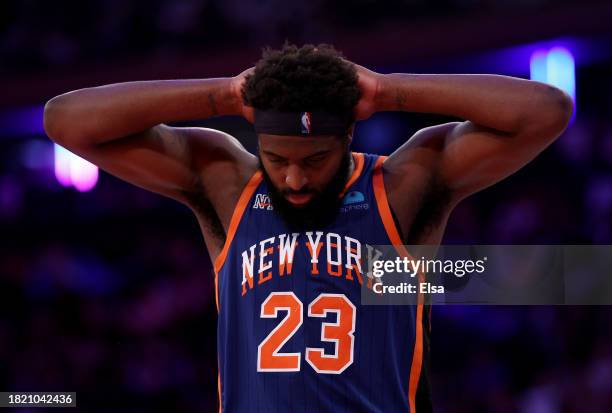 Mitchell Robinson of the New York Knicks reacts during the second half of an NBA In-Season Tournament game against the Charlotte Hornets at Madison...