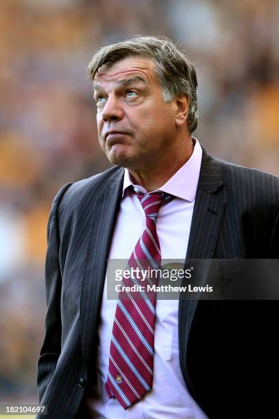 Sam Allardyce the West Ham manager reacts during the Barclays Premier League match between Hull City and West Ham United at KC Stadium on September...