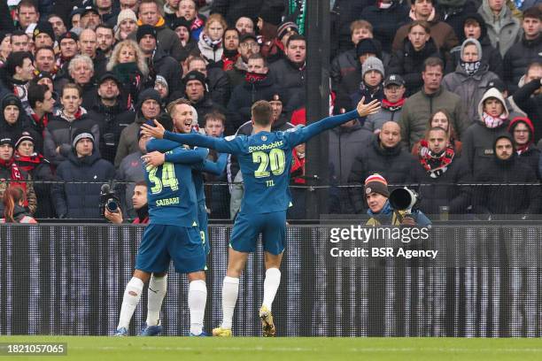 Ismael Saibari of PSV, Luuk de Jong of PSV, Guus Til of PSV celebrates after scoring the first goal of the team during the Dutch Eredivisie match...