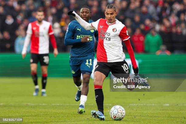 Calvin Stengs of Feyenoord shoots the ball during the Dutch Eredivisie match between Feyenoord and PSV at Stadion Feijenoord on December 3, 2023 in...