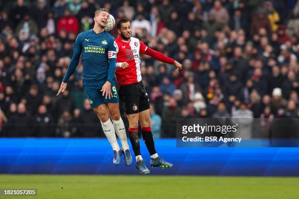 Luuk de Jong of PSV battles for the headed ball with David Hancko of Feyenoord during the Dutch Eredivisie match between Feyenoord and PSV at Stadion...