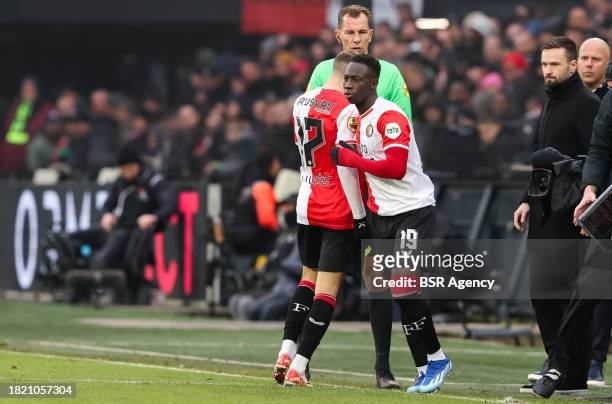 Luka Ivanusec of Feyenoord is substituted for Yankuba Minteh of Feyenoord during the Dutch Eredivisie match between Feyenoord and PSV at Stadion...