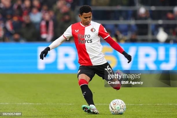 Marcos Lopez of Feyenoord shoots the ball during the Dutch Eredivisie match between Feyenoord and PSV at Stadion Feijenoord on December 3, 2023 in...