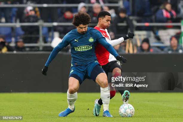 Marcos Lopez of Feyenoord battles for the ball with Andre Ramalho of PSV during the Dutch Eredivisie match between Feyenoord and PSV at Stadion...