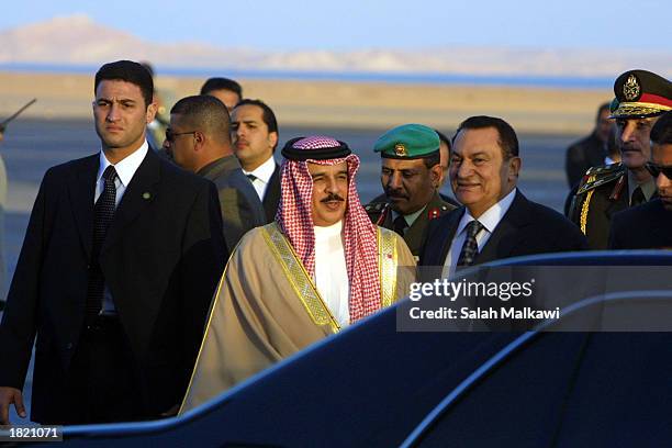 King of Bahrain, Hamad Bin Isa Al-Khalifa , the chairman of the Arab Summit, is welcomed by Egyptian President, Hosni Mubarak as he arrives at Sharm...