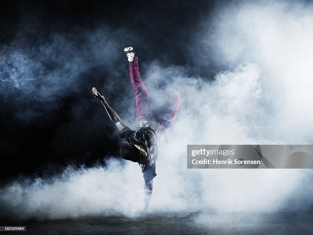 Dancer surrounded by smoke