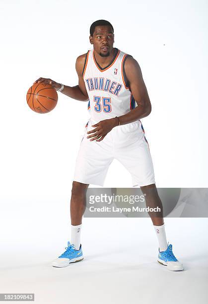 Kevin Durant poses for a portrait during 2013 NBA Media Day on September 27, 2013 at the Thunder Events Center in Edmond, Oklahoma. NOTE TO USER:...