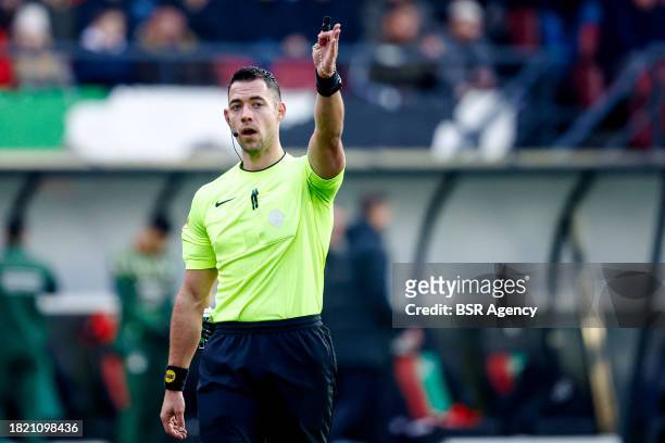 Referee Marc Nagtegaal gestures during the Dutch Eredivisie match between NEC Nijmegen and AFC Ajax at Goffertstadion on December 3, 2023 in...