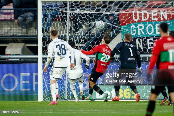 Carlos Forbs of AFC Ajax scores a goal, Bart van Rooij of NEC, Goalkeeper Jasper Cillessen of NEC unable to deflect during the Dutch Eredivisie match...