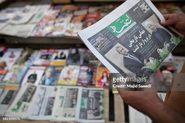 President Barack Obama and Iranian President Hassan Rouhani are depicted in Iranian newspapers on a newsstand on September 28, 2013 in Tehran, Iran....