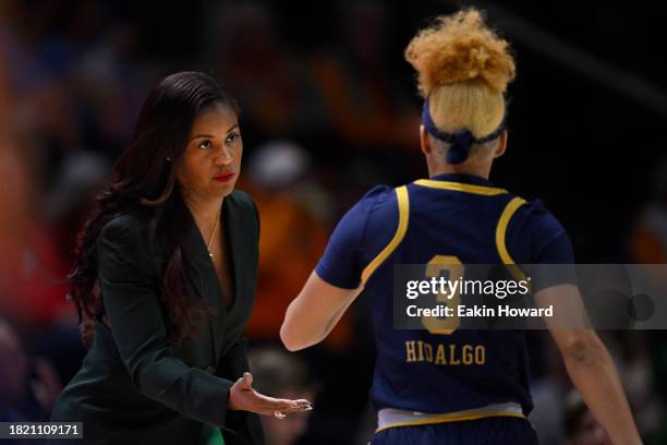 Head coach Niele Ivey of the Notre Dame Fighting Irish speaks with Hannah Hidalgo against the Tennessee Lady Vols in the first quarter at...