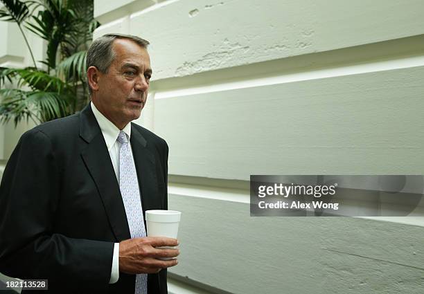 Speaker of the House Rep. John Boehner arrives at a House Republican Conference meeting at the Capitol September 28, 2013 on Capitol Hill in...