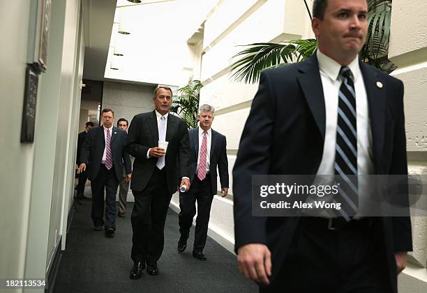 Speaker of the House Rep. John Boehner arrives at a House Republican Conference meeting at the Capitol September 28, 2013 on Capitol Hill in...