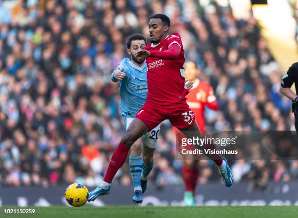 Ryan Gravenberch of Liverpool and Bernardo Silva of Manchester City in action during the Premier League match between Manchester City and Liverpool...